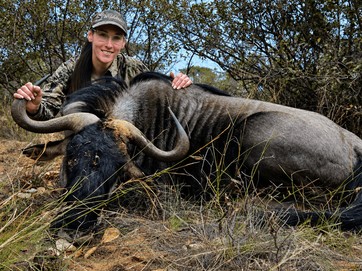 Hunter with a blue wildebeest trophy on a guided safari at Bougasvlei Safaris